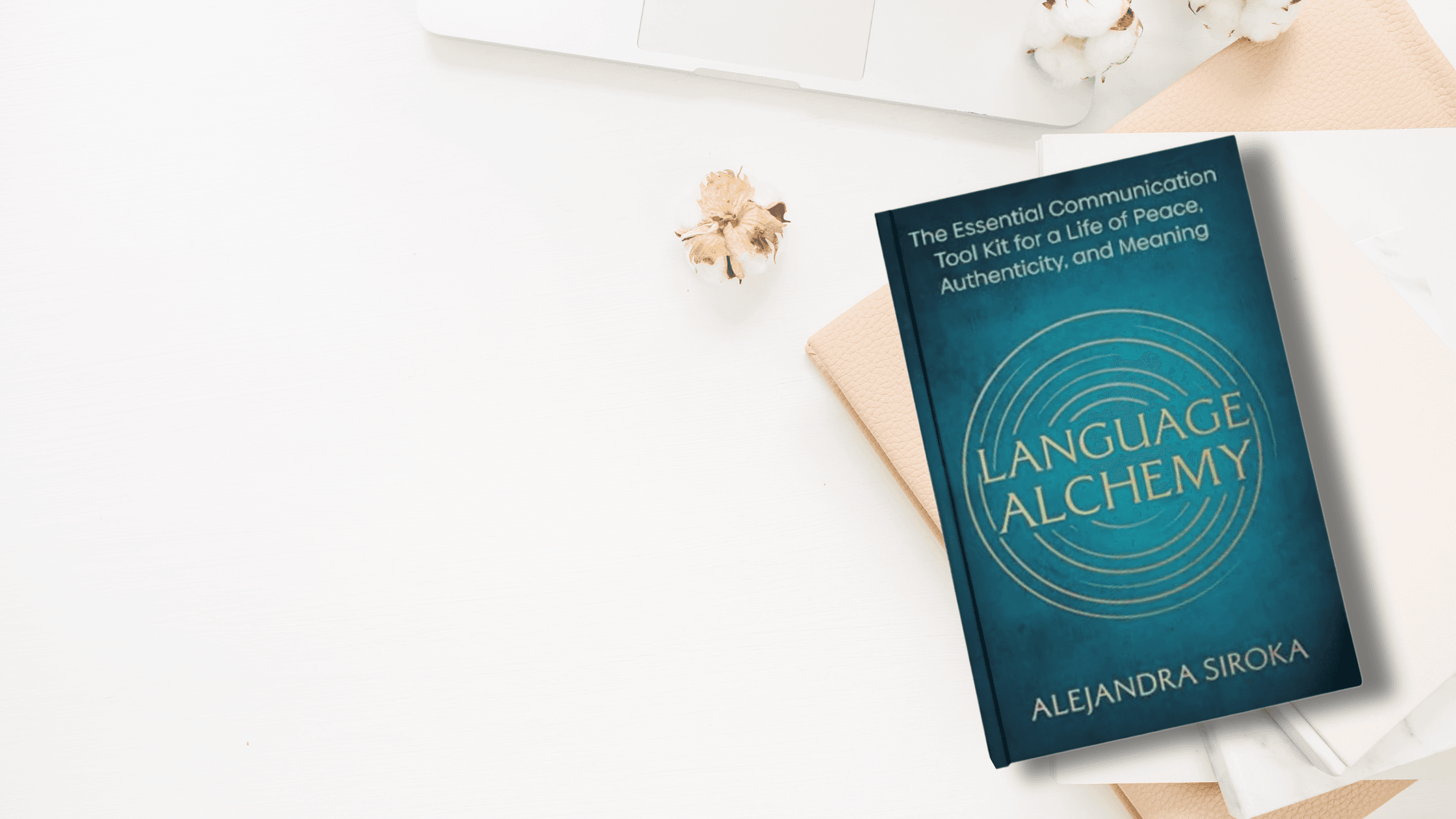 A copy of Language Alchemy resting on a desk, inviting readers to join the Substack community